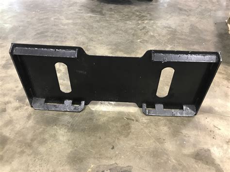 skid steer adapter plate size